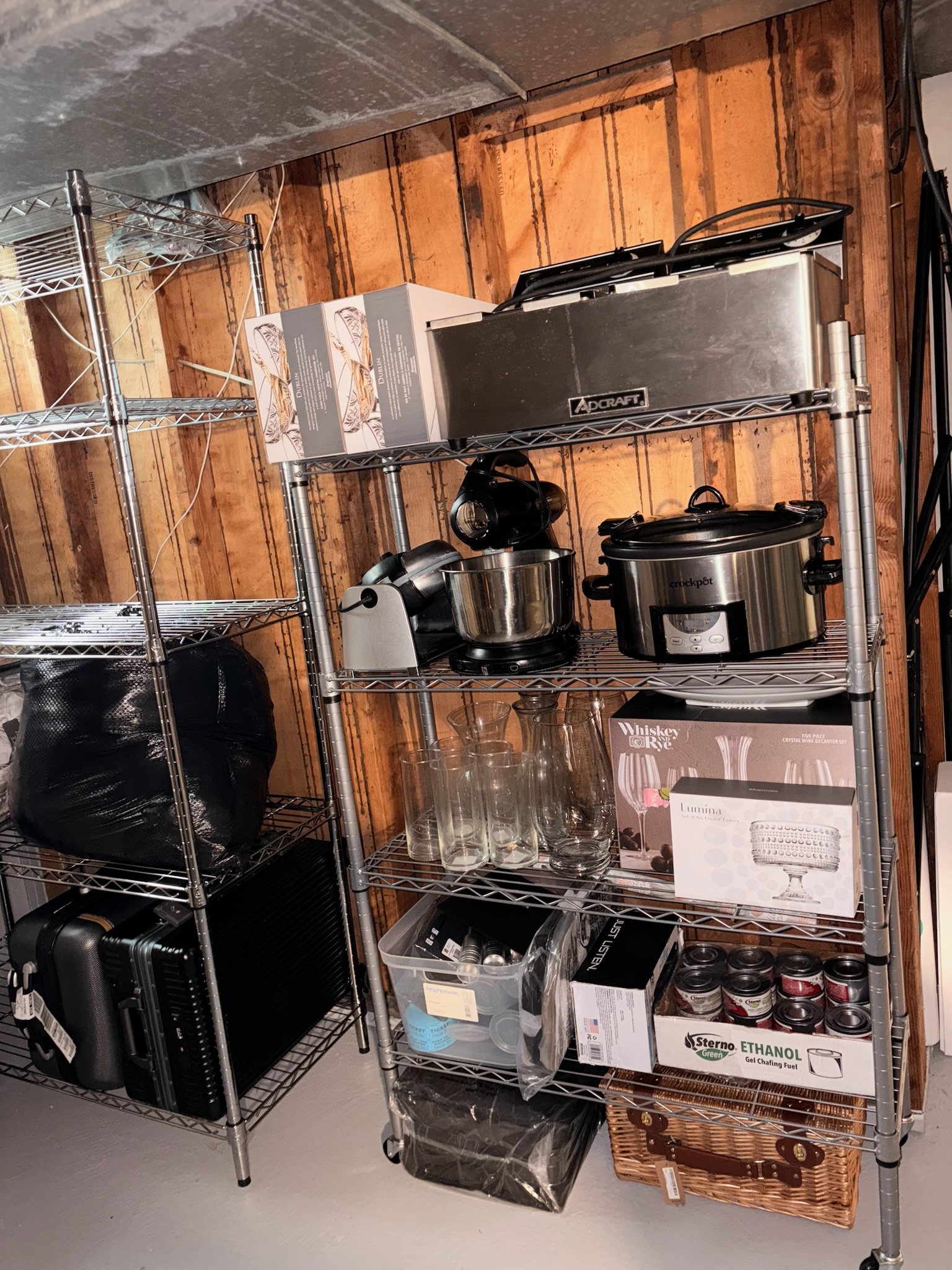 The basement storage shelves organized after the reset