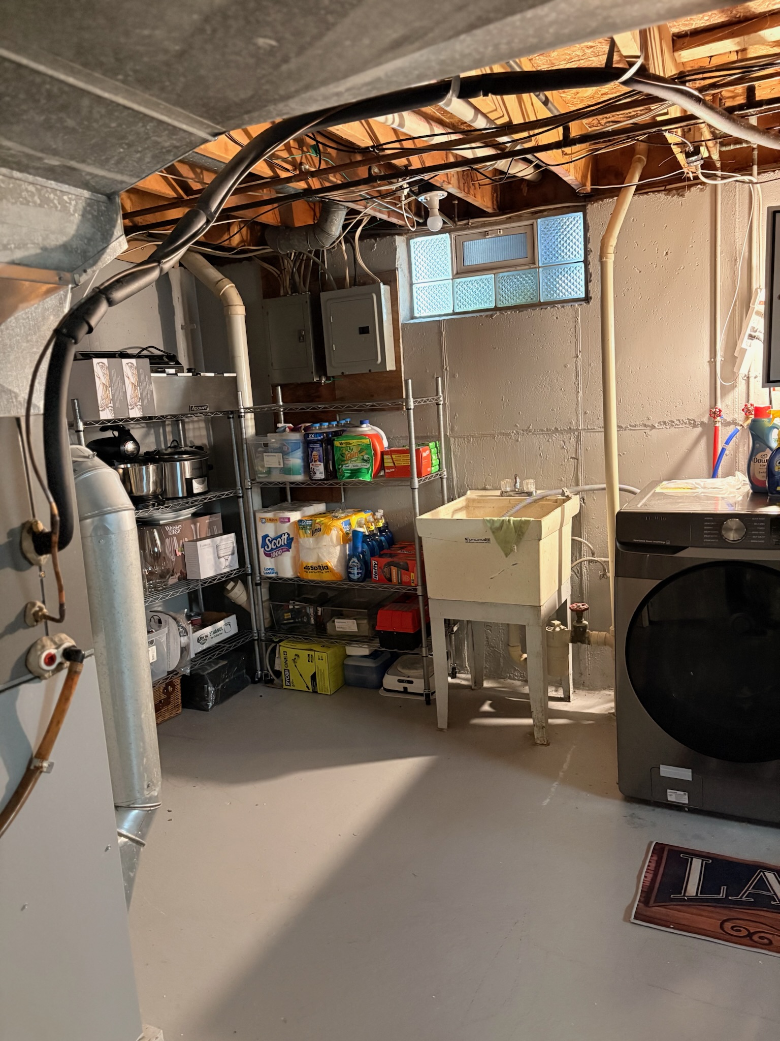 The basement laundry area organized after the reset