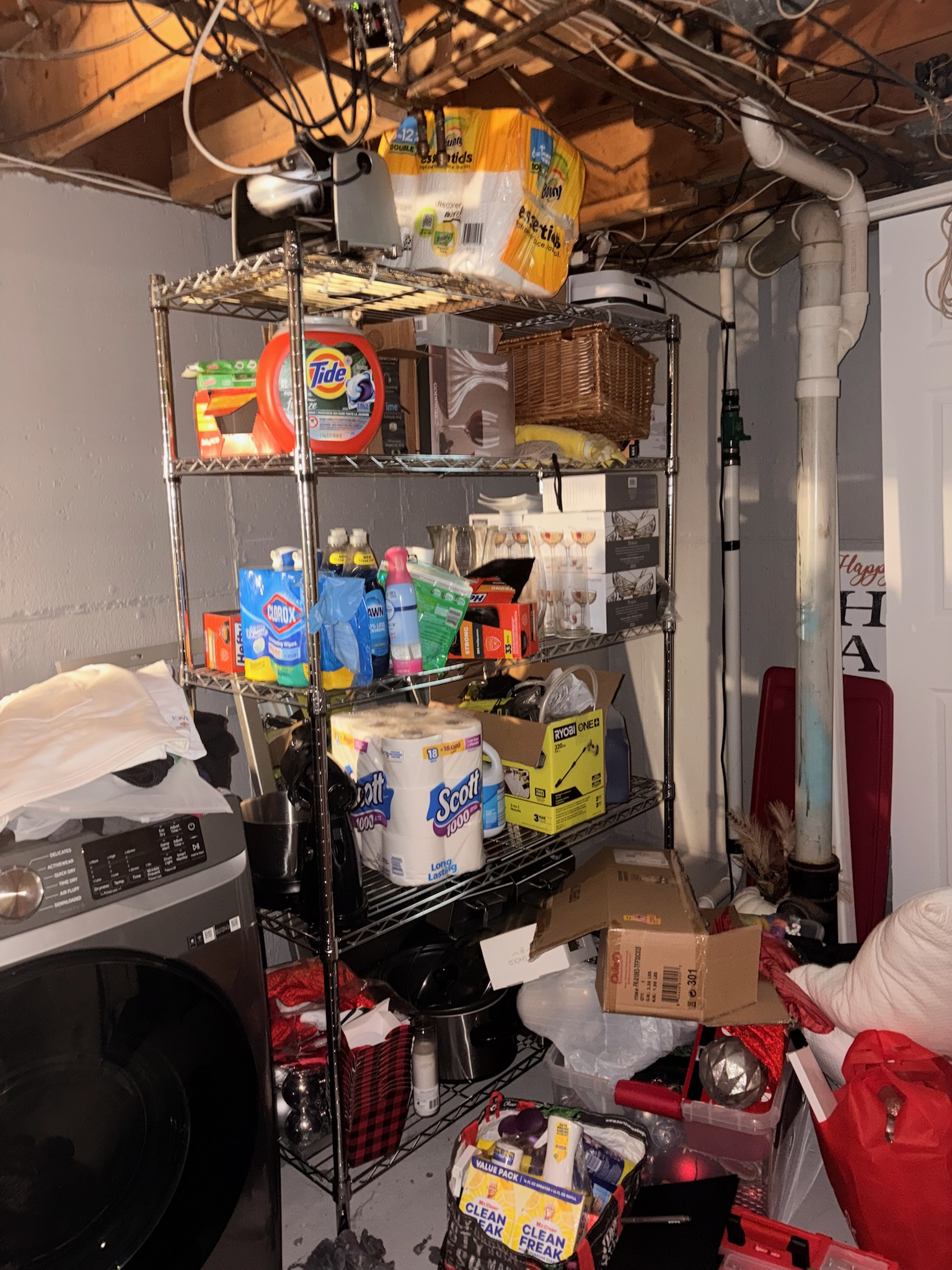 Another view of the cluttered basement before