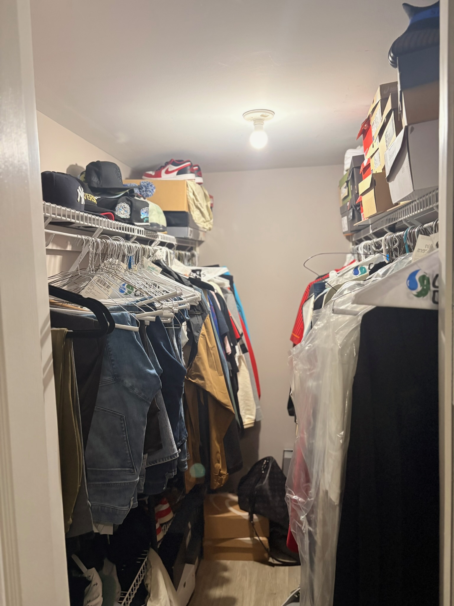 Packed walk-in closet before a reset